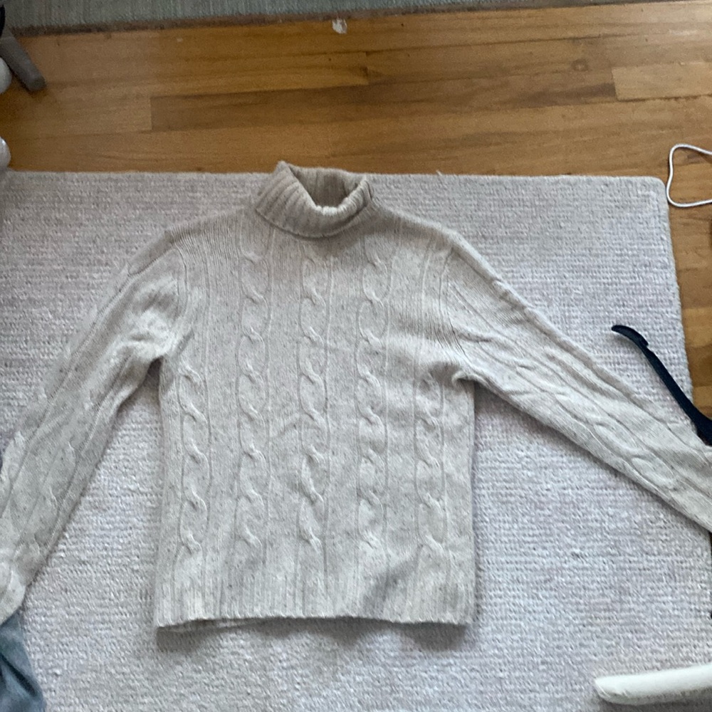 Brooks Brother’s cable cashmere sweater. Turtleneck. Very soft cashmere